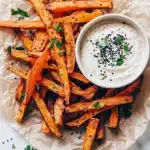 Crispy Baked Sweet Potato Fries with Roasted Garlic Tahini Yogurt Dip Recipe