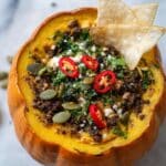 Pumpkin Chorizo Queso Fundido with Pepitas and Cotija Recipe