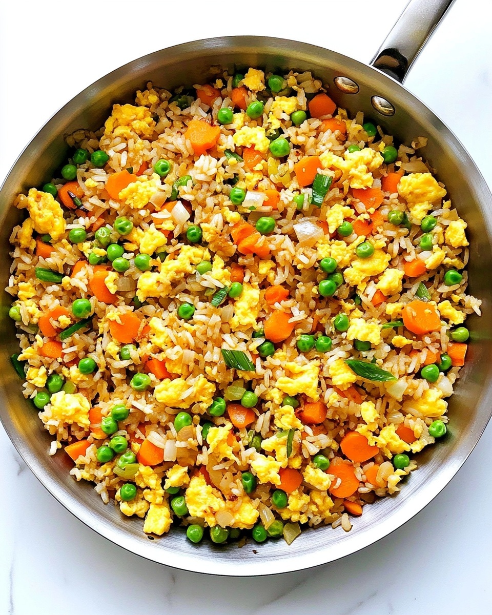 A white bowl filled with three main layers of fried rice. The bottom layer is made up of mixed brown and white rice grains, slightly shiny, with a few small green peas scattered throughout. The middle layer has bright yellow scrambled eggs, broken into small chunks that mix with the rice. The top layer has fresh red bell pepper pieces and chopped green onions, adding a colorful contrast. A woman's hand is seen holding dark wooden chopsticks, picking up some of the rice mixture. The bowl sits on a white marbled surface with a clean background. photo taken with an iphone --ar 4:5 --v 6.1