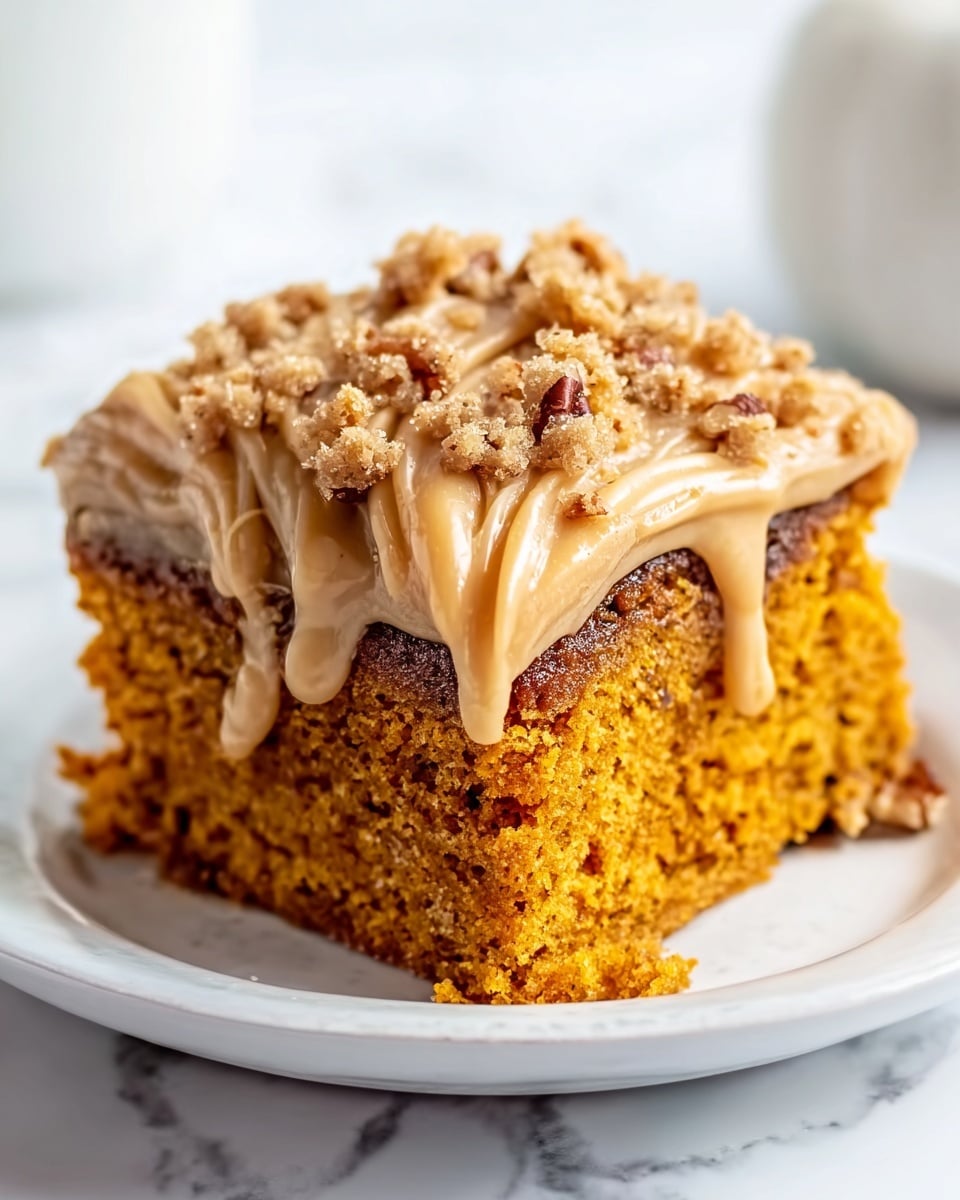 The image shows a single square slice of cake with three layers. The bottom layer is a dense brown cake, the middle layer is a slightly darker brown cake, and the top layer is a thick, light caramel-colored glaze that drips over the sides. On top of the glaze, there is a large amount of finely chopped nuts scattered, giving a crunchy texture. The cake is placed on a plain white plate, and the background has a white marbled texture. The photo taken with an iphone --ar 4:5 --v 7