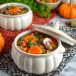 Slow Cooker Witches' Brew Stew with Pumpkin-Shaped Carrots and Skull Mushrooms Recipe