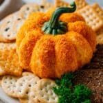 Pumpkin-Shaped Cheese Ball with Crunchy Crackers and Bell Pepper Stem Recipe