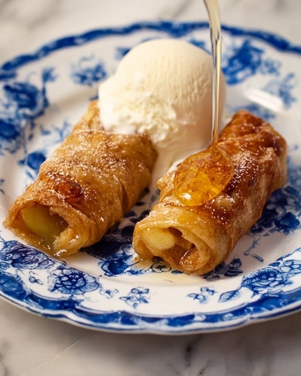 The image shows ingredients arranged on a smooth gray surface with a blurred kitchen background. From left to right, there is a yellow-capped cinnamon bottle, two green apples, and a white bowl filled with white sugar in the front. Behind the bowl are two blue rolls of crescent dough standing vertically. Next to them are two green cans of Mountain Dew stacked one on top of the other. To the right of the cans, there are two sticks of butter stacked, paper wrappers showing text, and behind them is a small dark brown bottle of pure vanilla with a red cap. The setting is calm and organized, focusing clearly on the ingredients without any plate or food dish. photo taken with an iphone --ar 4:5 --v 7