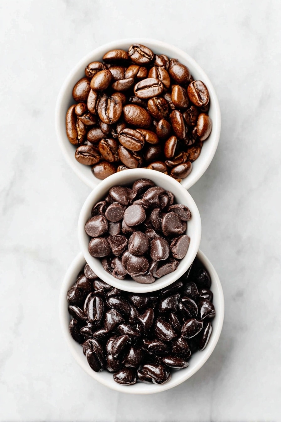 Chocolate Covered Espresso Beans Recipe 7 Flat lay of a small heap of glossy dark espresso beans, a small white ceramic bowl filled with rich semi-sweet chocolate chips, placed on a clean white marble surface, soft natural light, photo taken with an iPhone, professional food photography style, fresh ingredients, white ceramic bowls, no bottles, no duplicates, no utensils, no packaging --ar 2:3 --v 7 --p m7354615311229779997 - Chocolate Covered Espresso Beans, espresso beans snack, homemade coffee candies, caffeine chocolate treats, quick coffee chocolate recipe