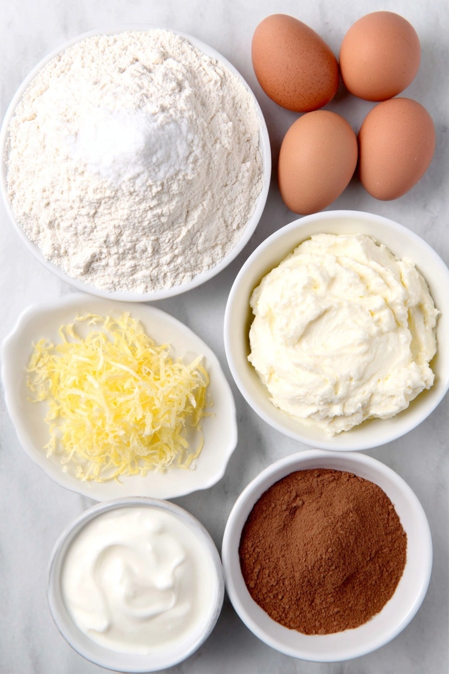 Greek Yogurt Pancakes Recipe 7 Flat lay of a small mound of all-purpose flour, a small white ceramic bowl of granulated sugar, two whole uncracked brown eggs, a few thin strips of fresh lemon zest, a small white ceramic bowl of fresh lemon juice, a small white ceramic bowl of Greek yogurt, a small white ceramic bowl of melted butter, a small white ceramic bowl of milk, and a small heap of ground cinnamon powder placed on a clean white marble surface, soft natural light, photo taken with an iPhone, professional food photography style, fresh ingredients, white ceramic bowls, no bottles, no duplicates, no utensils, no packaging --ar 2:3 --v 7 --p m7354615311229779997 - Greek Yogurt Pancakes, fluffy Greek yogurt pancakes, easy breakfast pancake recipes, lemon yogurt pancakes, moist healthy pancakes