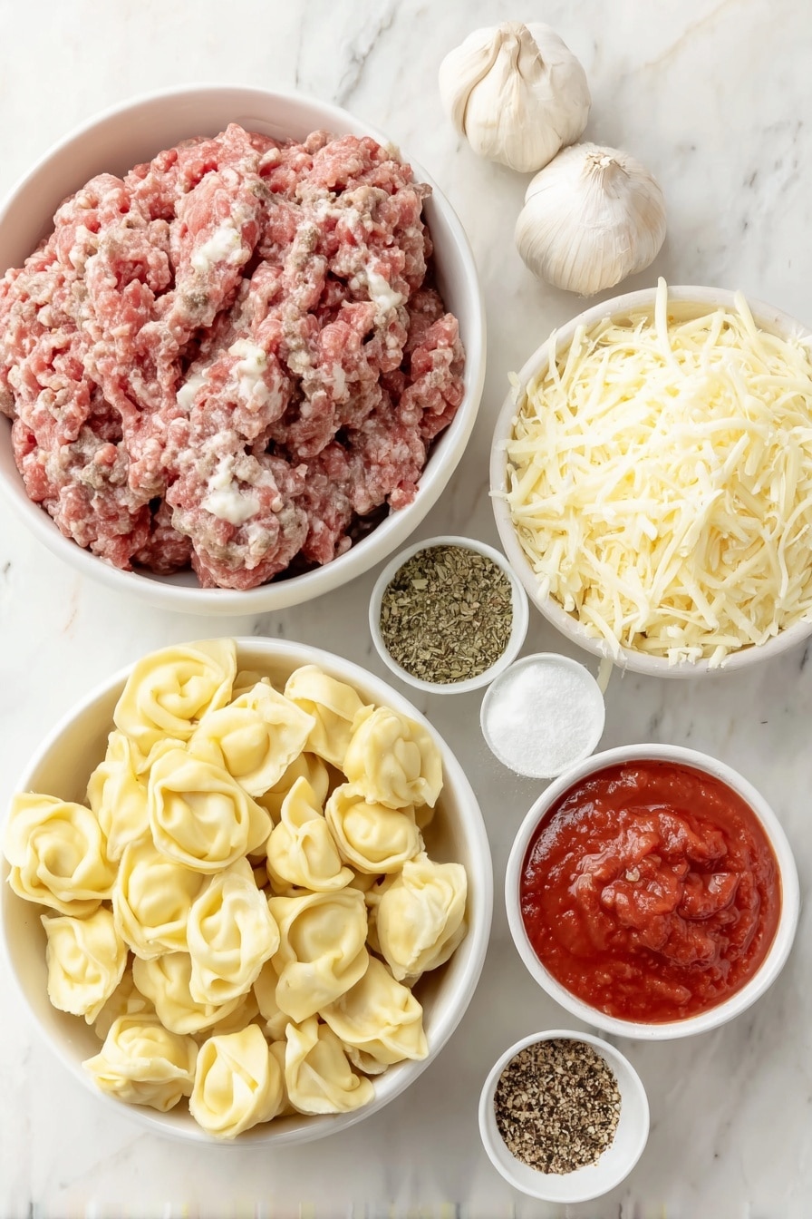 Cheesy Baked Tortellini with Ground Beef Recipe 7 Flat lay of a mound of fresh ground beef, three large peeled garlic cloves, small white ceramic bowls with dried basil, dried parsley, dried oregano, dried thyme, and crushed red pepper flakes, a small white ceramic bowl with coarse salt and freshly ground black pepper, a small white ceramic bowl filled with bright red marinara sauce, fresh cheese tortellini arranged in a clean white ceramic bowl, a heap of shredded mozzarella cheese, a small pile of grated Parmesan cheese, all arranged symmetrically on a clean white marble surface, soft natural light, photo taken with an iPhone, professional food photography style, fresh ingredients, white ceramic bowls, no bottles, no duplicates, no utensils, no packaging --ar 2:3 --v 7 --p m7354615311229779997 - Cheesy Baked Tortellini with Ground Beef, baked tortellini recipes, hearty pasta casserole, cheesy ground beef pasta, family-friendly baked pasta
