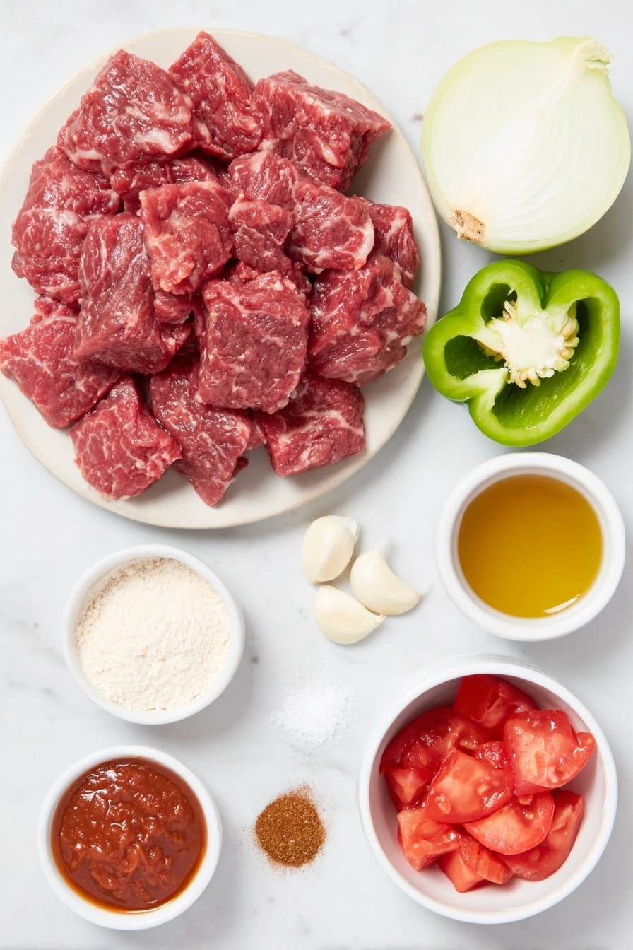 Classic Beef Carne Guisada Recipe 7 Flat lay of two pounds of cubed chuck steak with rich red marbling, a large white onion halved to show its fresh layers, one vibrant green bell pepper sliced to reveal its seeds, three peeled garlic cloves, a small white ceramic bowl filled with deep red tomato paste, two ripe red tomatoes diced to show juicy flesh, a small white bowl of light beige all-purpose flour powder, a small white bowl with golden cooking oil, a small white bowl of dark brown beef broth, and small piles of coarse salt, black peppercorns, ground cumin, and chili powder arranged neatly on a simple white ceramic plate, all placed on a clean white marble surface, soft natural light, photo taken with an iPhone, professional food photography style, fresh ingredients, white ceramic bowls, no bottles, no duplicates, no utensils, no packaging --ar 2:3 --v 7 --p m7354615311229779997 - Classic Beef Carne Guisada, beef guisada recipe, hearty beef stew, Mexican beef stew, comfort food recipes